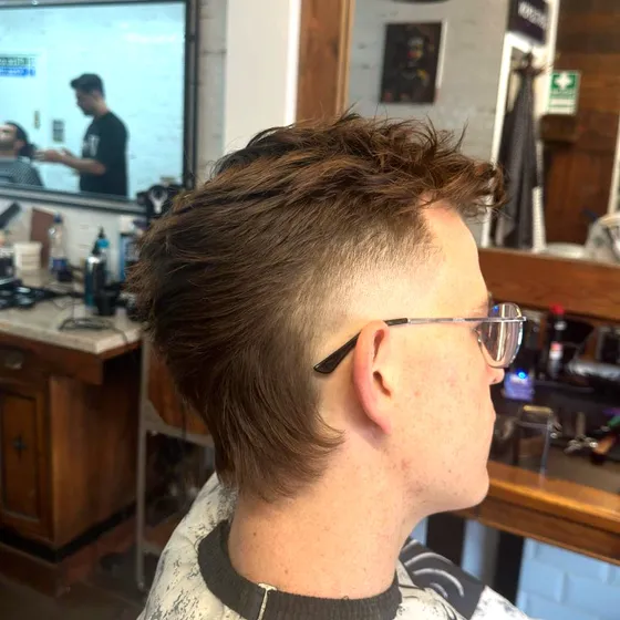A textured burst mullet finished at Dapper Chaps