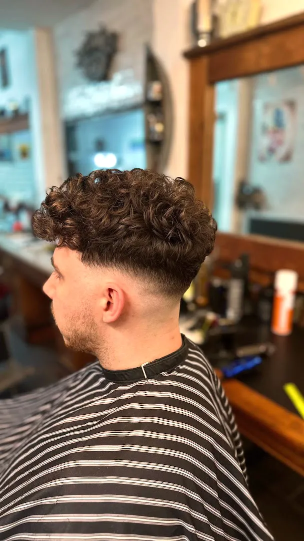 A regular's curly fade, finished at Dapper Chaps